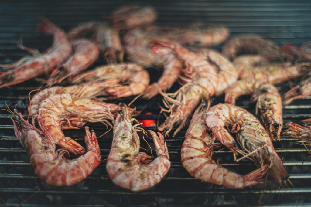 grilled sausage on black grill