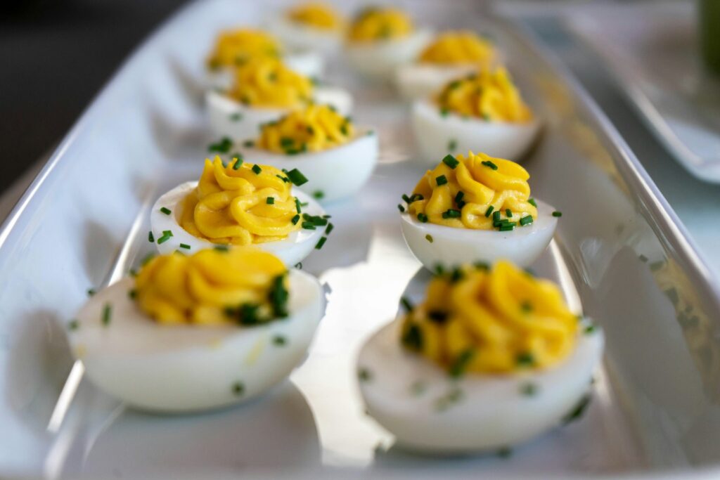 white and yellow icing covered cupcakes