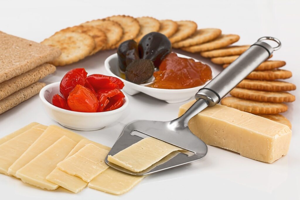 cheese slicer, crackers, appetizers, dairy product, protein, finger food, snack, hors d'oeuvre, sliced, cut, diet, food, biscuits, nutrition, buffet, platter, nourishment, cheese slicer, cheese slicer, crackers, crackers, crackers, crackers, crackers, finger food, biscuits, biscuits, biscuits