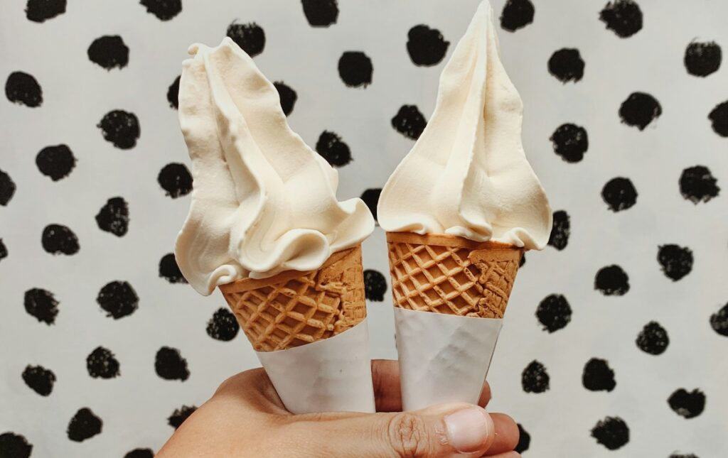 person holding ice creams