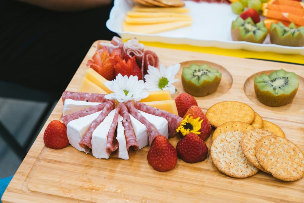 Delicious charcuterie board with various snacks.